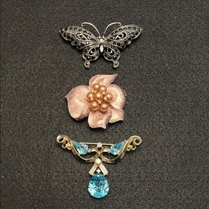 Three brooch bundle